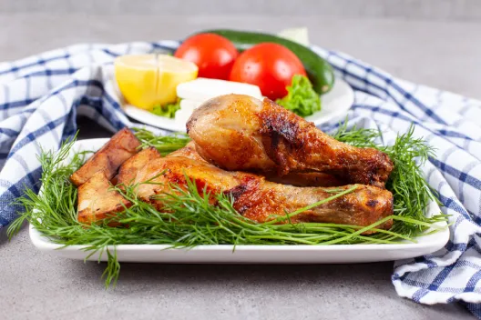 Antipasto platter with grilled chicken, tomatoes, and cheese