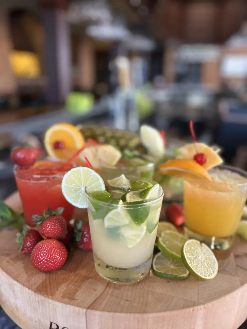 Colorful Brazilian cocktails including Caipirinha at Leblon bar