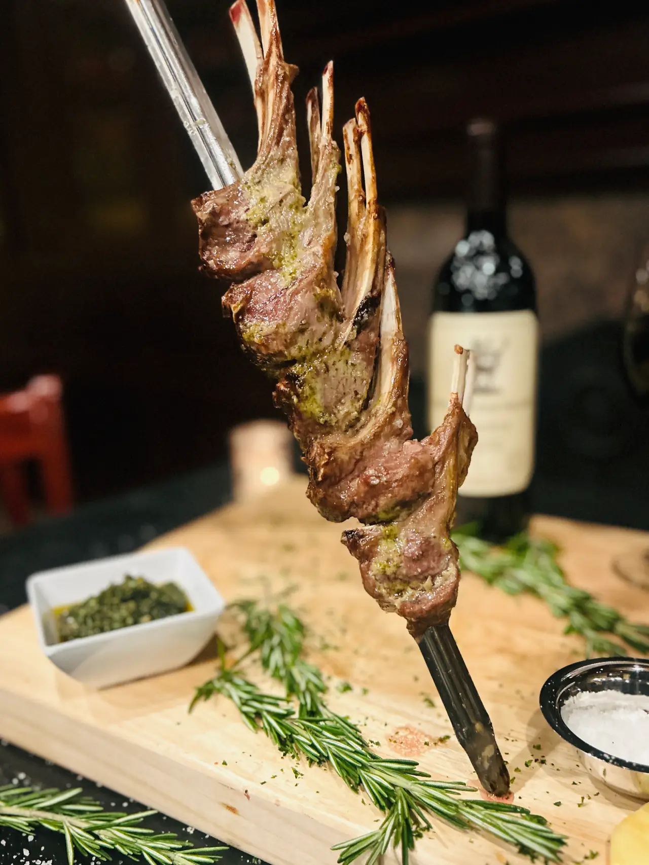 Grilled meat skewer served with red wine at Leblon Churrascaria